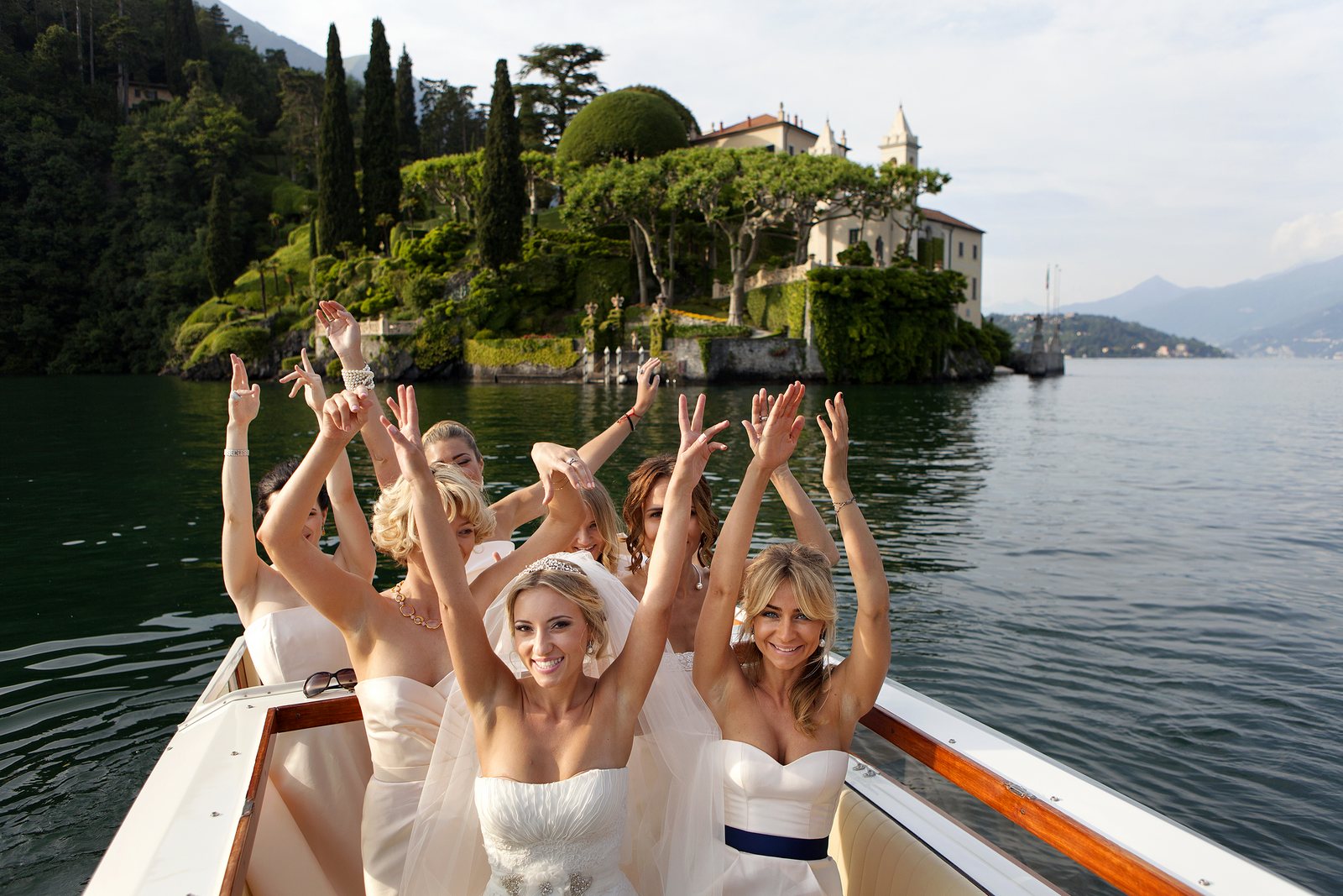 bride and bridesmaids in front of Villa Balbianello