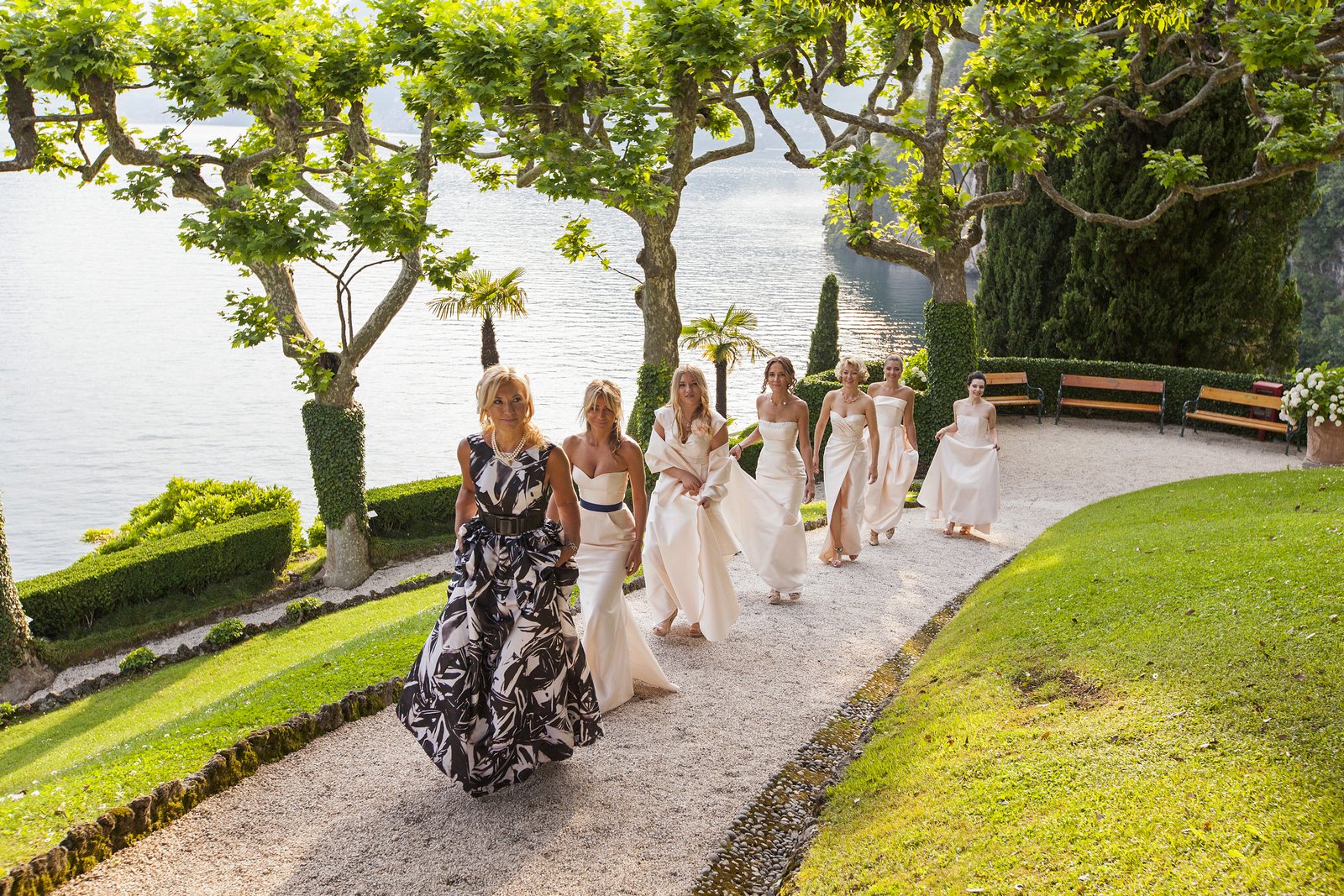 bride walks to wedding ceremony Villa Balbianello