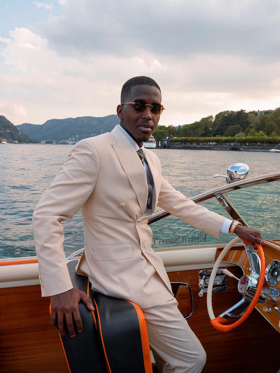 Stylish Groom on a Wooden Boat Ride on Lake Como