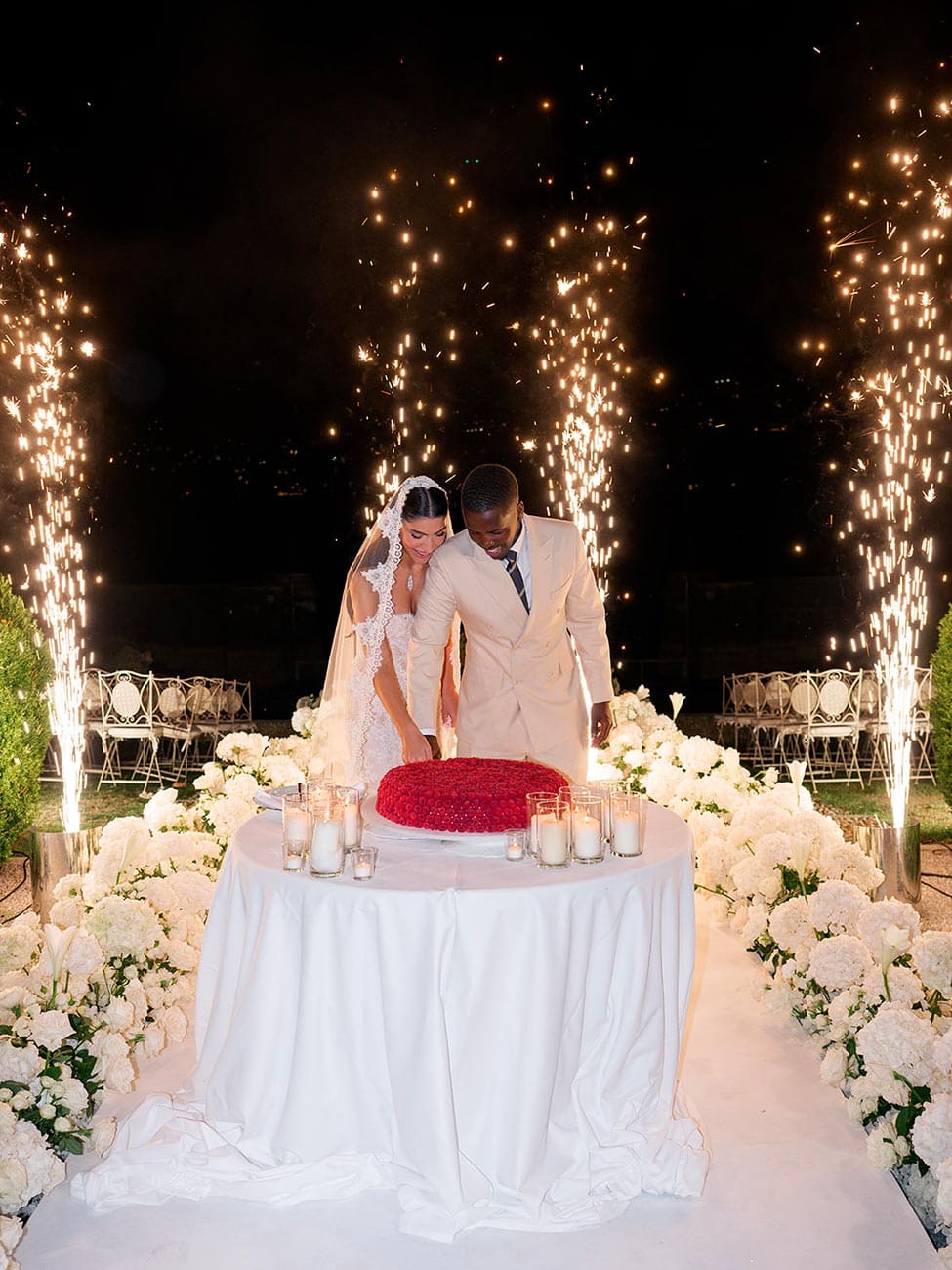 Cutting wedding cake Lake Como