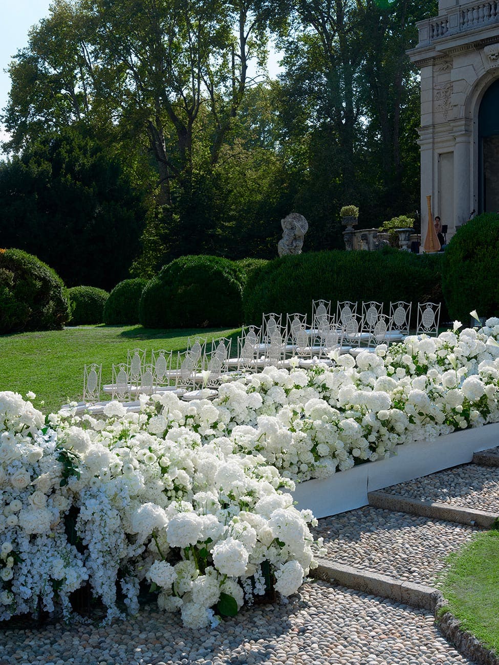 Outdoor wedding white flowers Lake Como